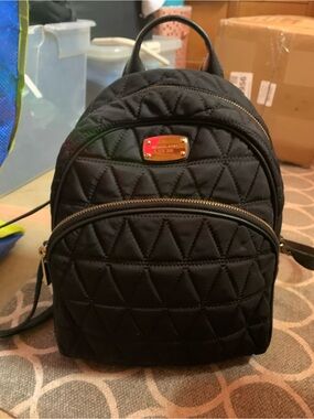 Michael Kors Black Quilted Mini Backpack with Gold Hardware
